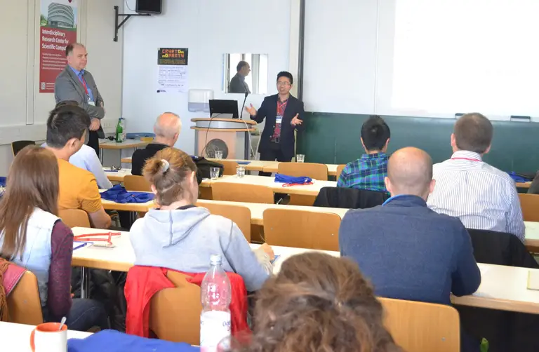 Tiến sỹ Nam báo cáo tại Hội nghị do mình tổ chức tại đại học Heidelberg